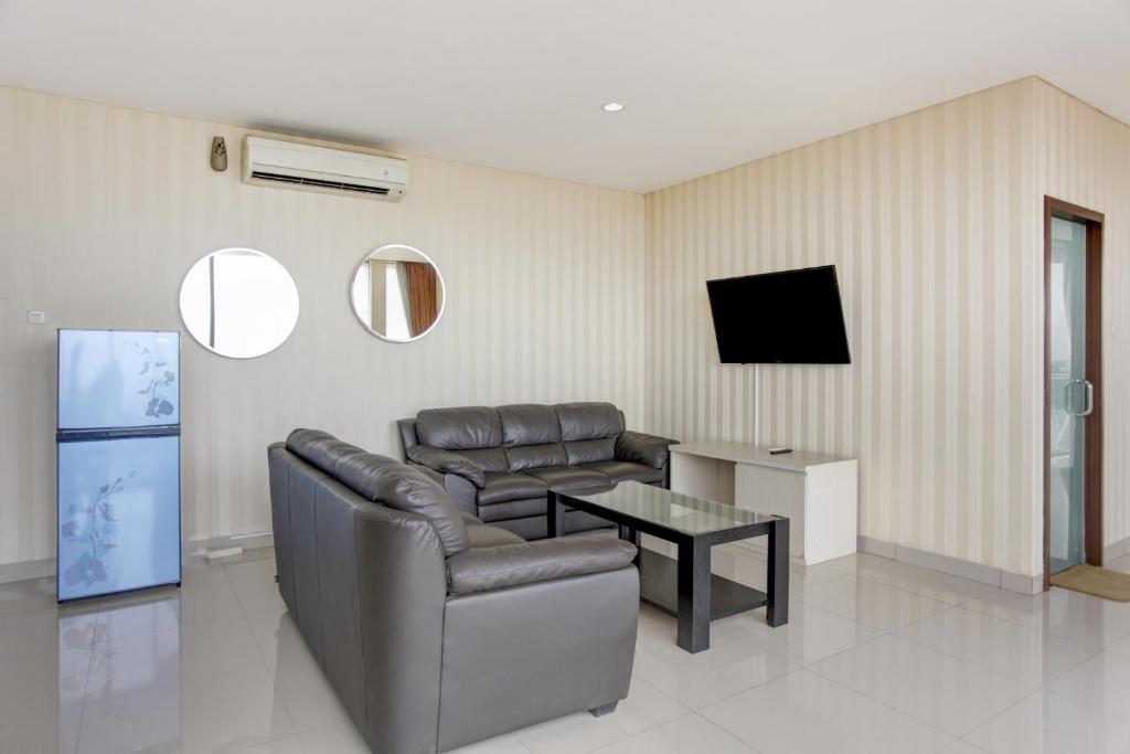 TV a/nebo společenská místnost v ubytování Collection O Hotel Igloo