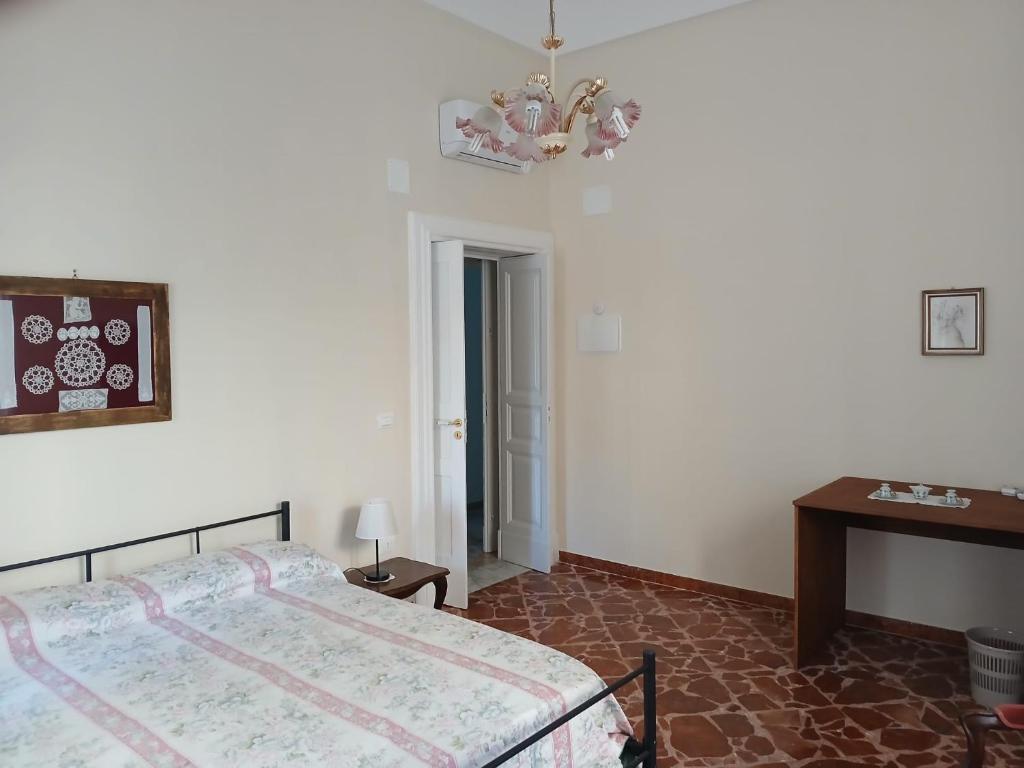 Postel nebo postele na pokoji v ubytování Palazzo delle favole