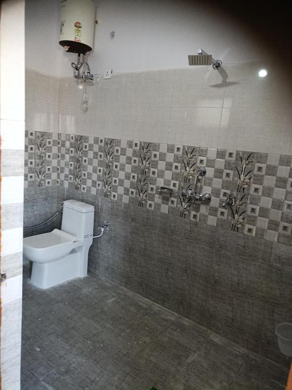 Koupelna v ubytování Parvatiya Homestay