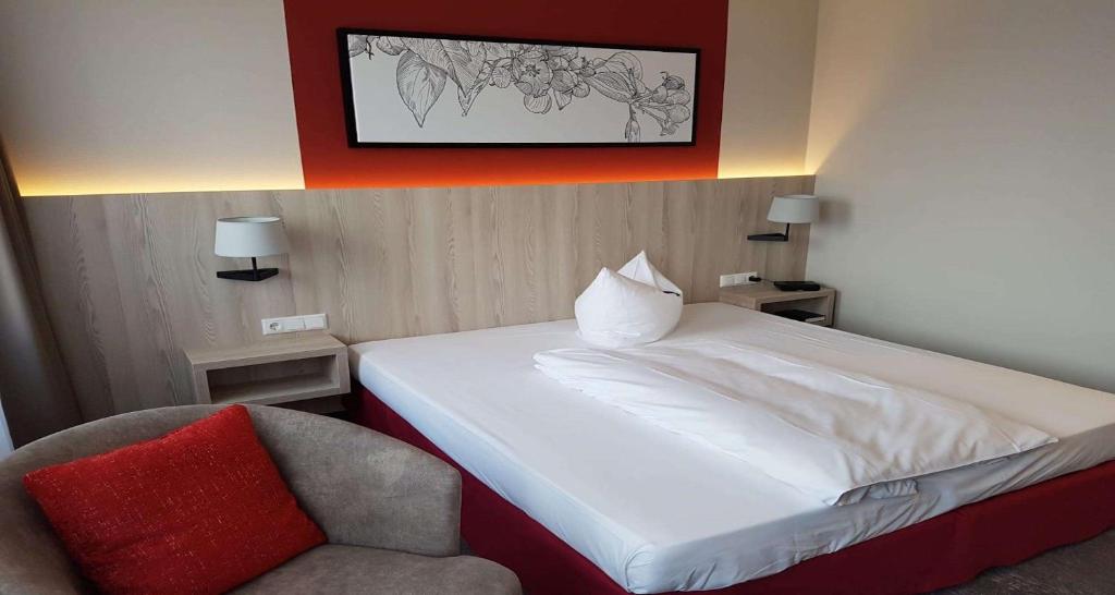 Postel nebo postele na pokoji v ubytování Best Western Erfurt-Apfelstädt
