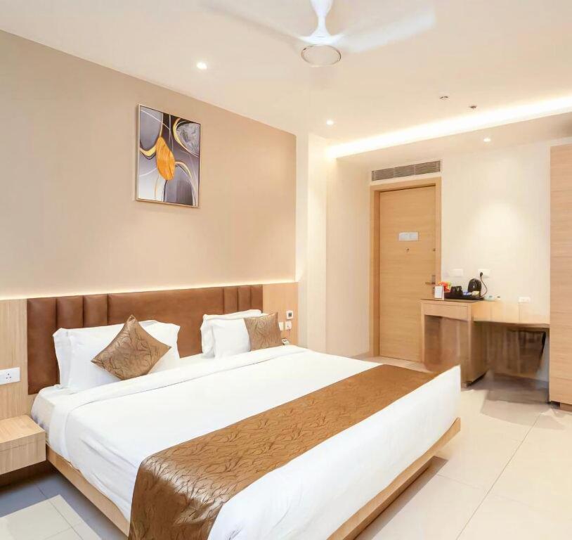 Postel nebo postele na pokoji v ubytování Hotel Ramida Plaza At Delhi Airport