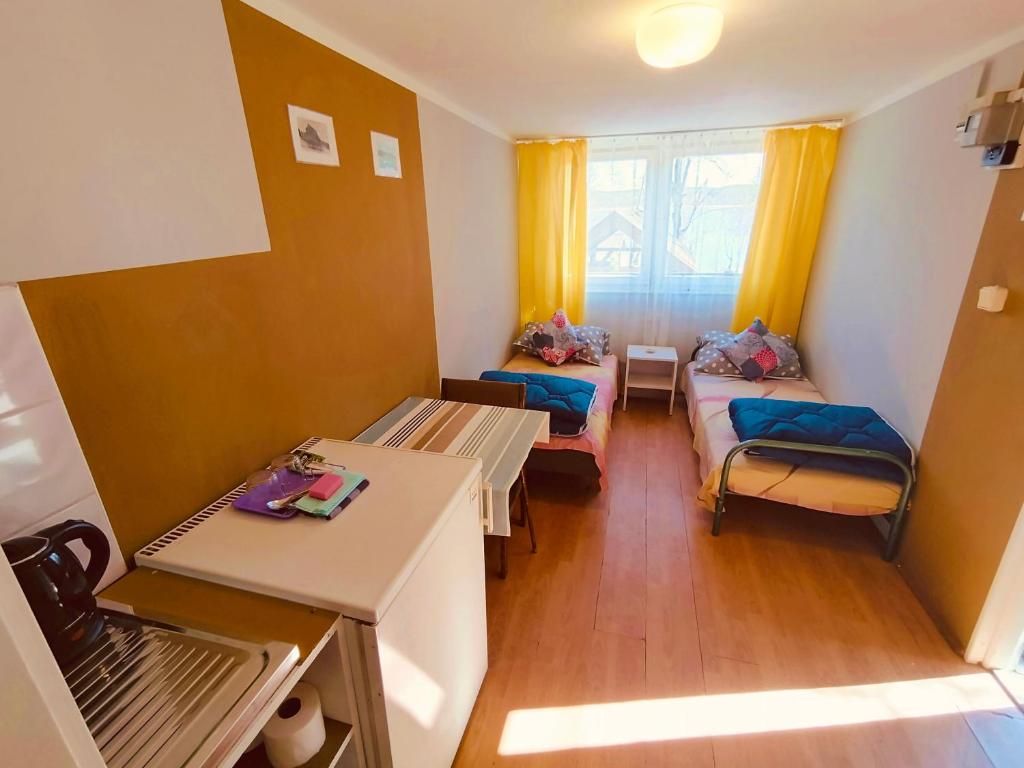 Postel nebo postele na pokoji v ubytování Stanica wodna Swornegacie PTTK