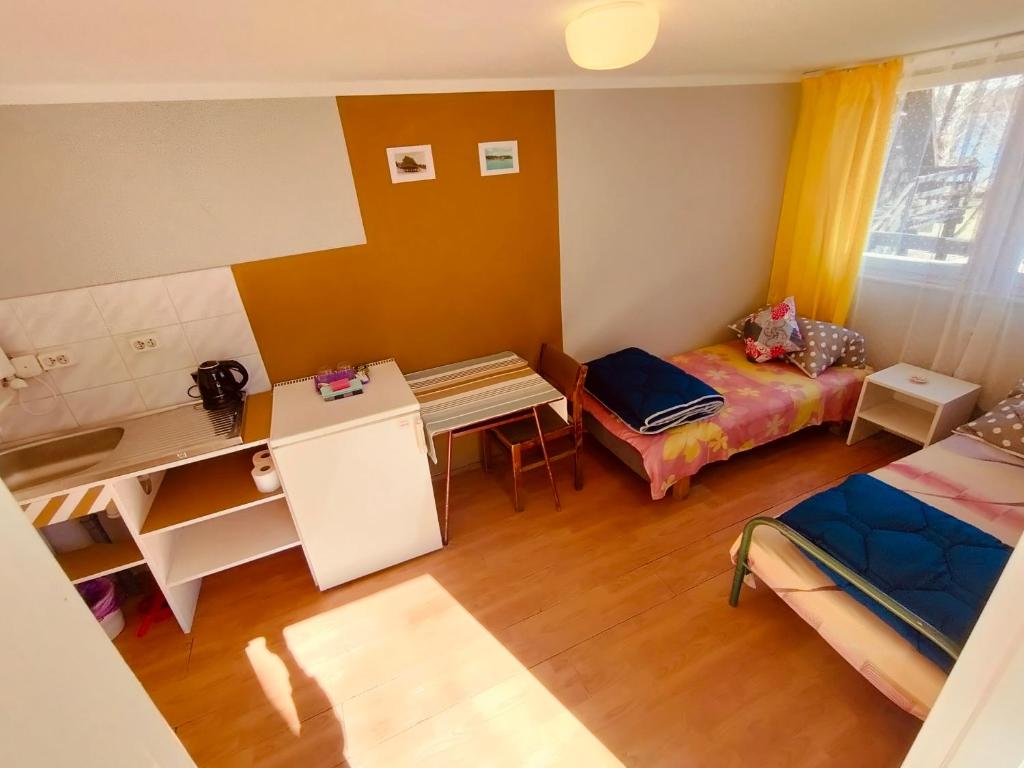 Postel nebo postele na pokoji v ubytování Stanica wodna Swornegacie PTTK