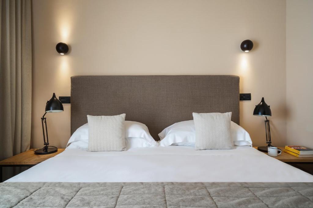 Postel nebo postele na pokoji v ubytování Hotel Select Suites & Spa - Apartments