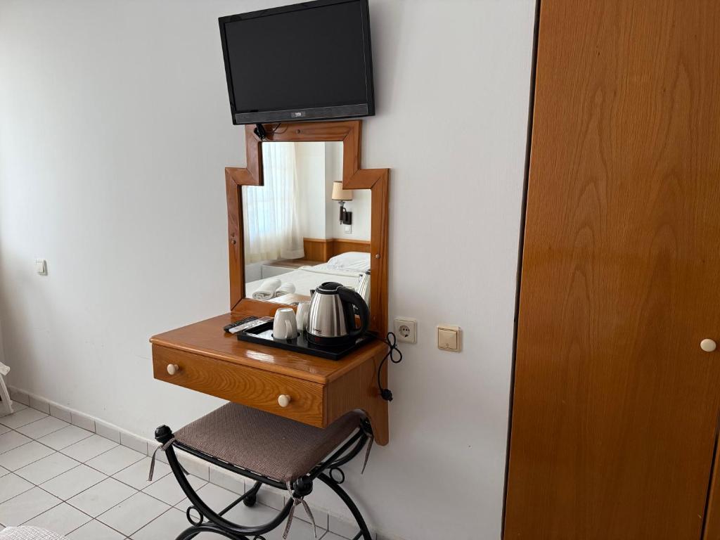 TV a/nebo společenská místnost v ubytování NATURELLA APART HOTEL