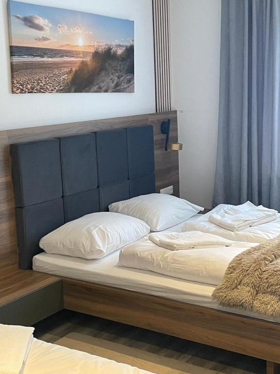 Postel nebo postele na pokoji v ubytování Ambiente