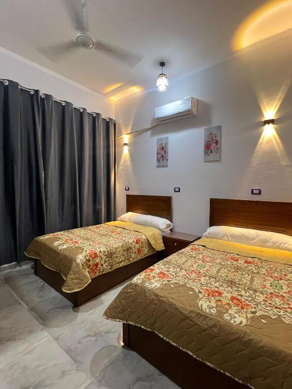 Ένα ή περισσότερα κρεβάτια σε δωμάτιο στο River view house