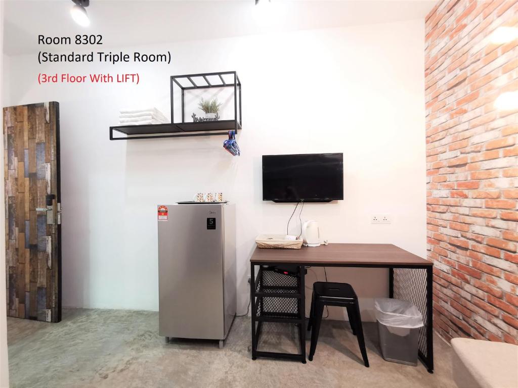 TV a/nebo společenská místnost v ubytování Mwv Family Suite Room