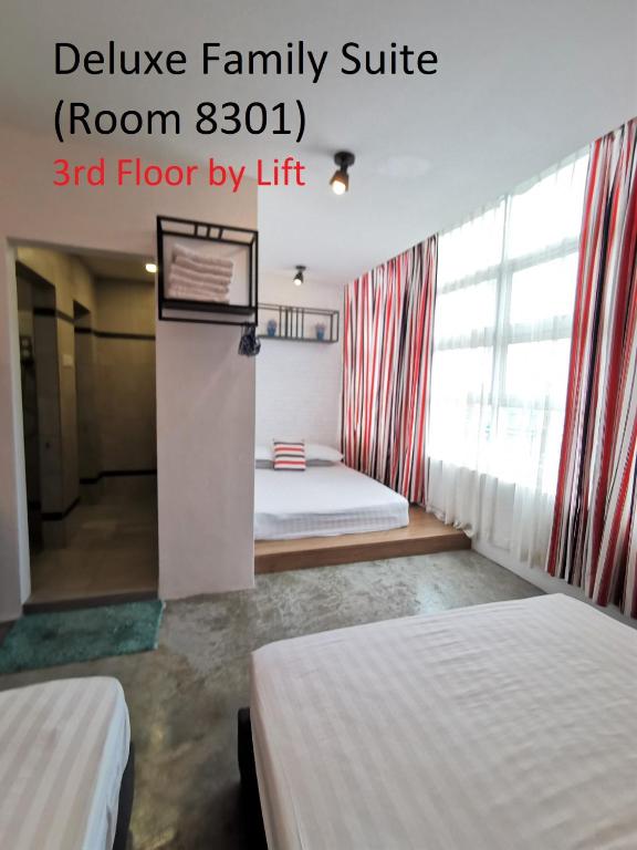 Postel nebo postele na pokoji v ubytování Mwv Family Suite Room