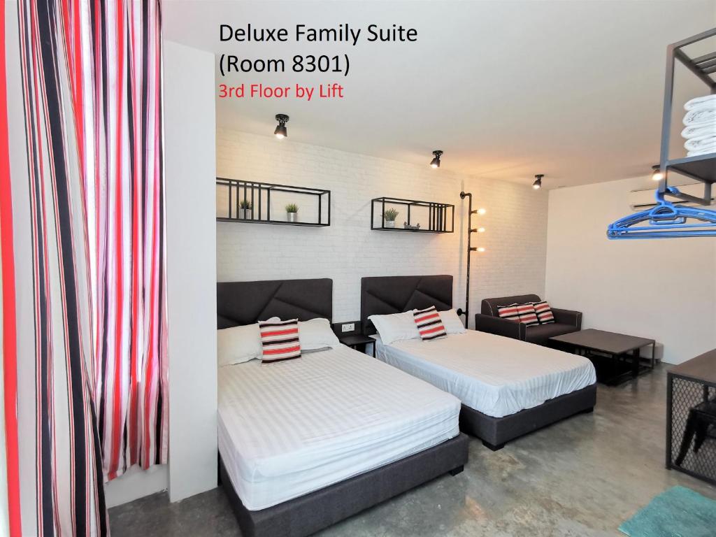 Postel nebo postele na pokoji v ubytování Mwv Family Suite Room