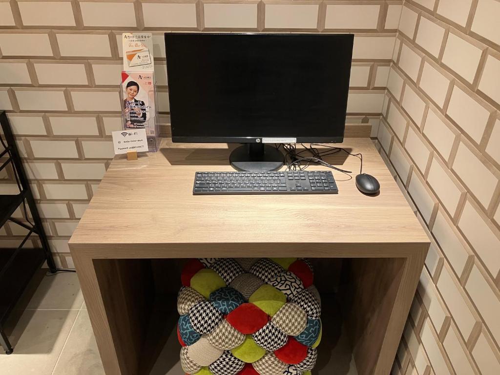 TV a/nebo společenská místnost v ubytování Smile Hotel Okayama