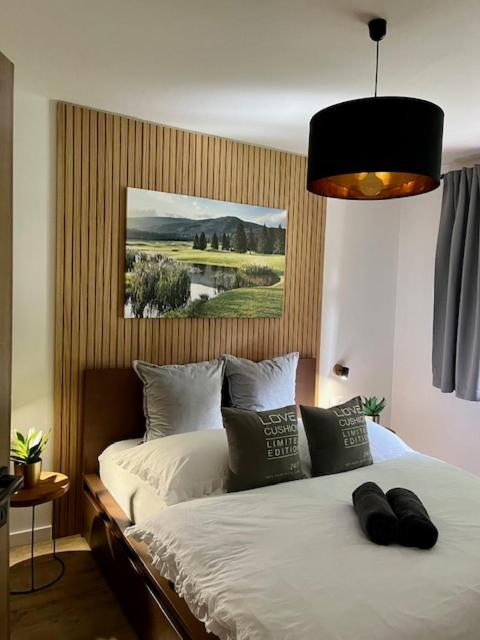 Postel nebo postele na pokoji v ubytování Apartmány na Táloch 107 & 108 Chopok - Juh
