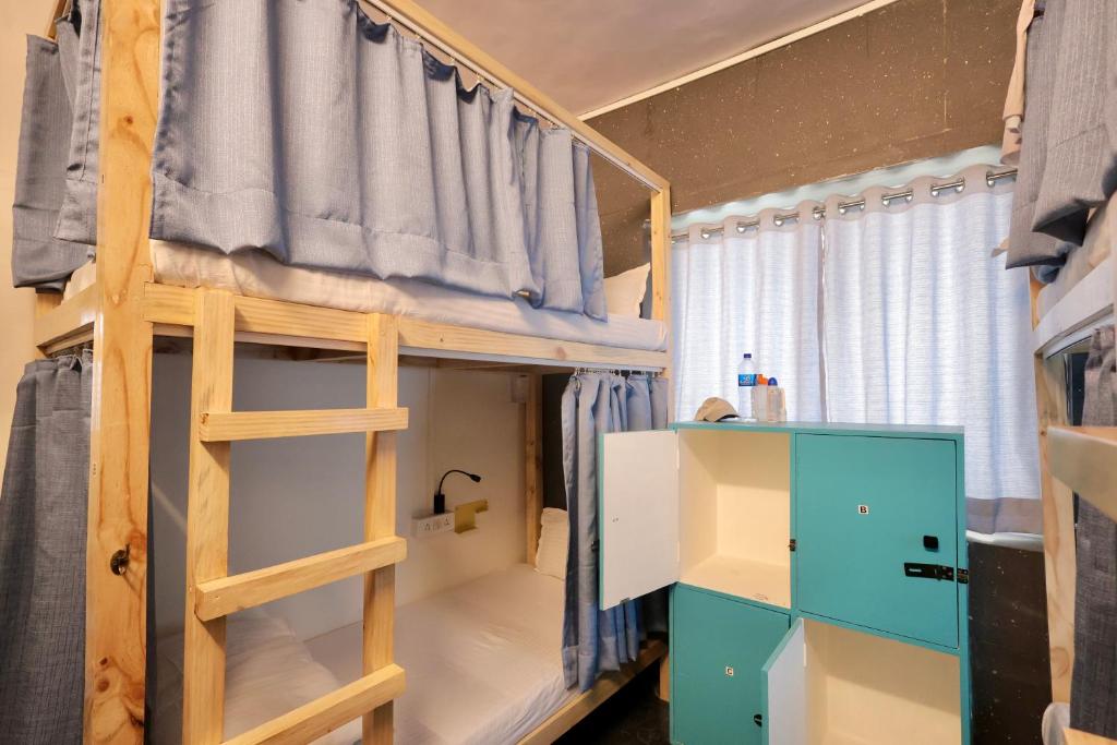 Postel nebo postele na pokoji v ubytování Locomo Mini