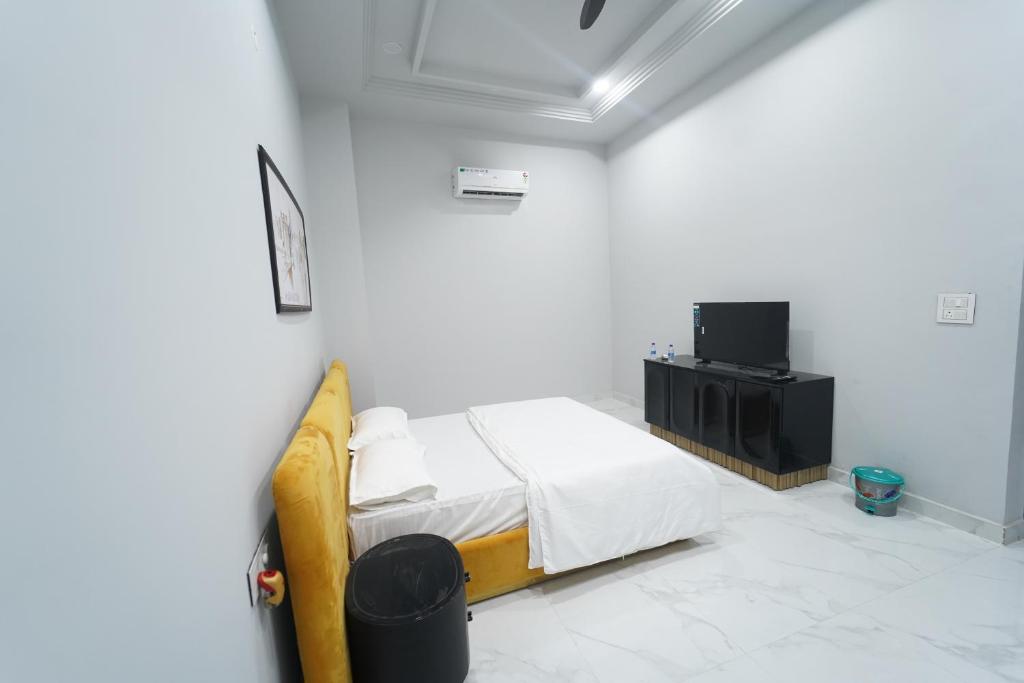 Postel nebo postele na pokoji v ubytování Crazzy Days Hotel I Sonipat