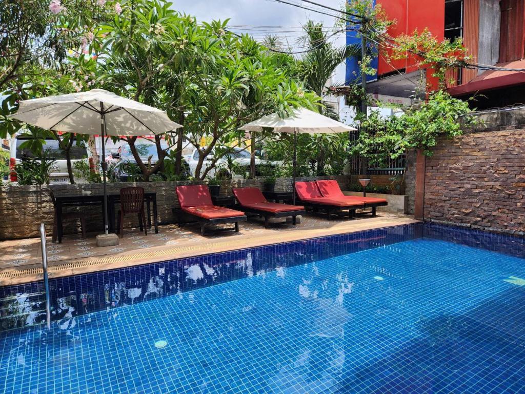 Bazén v ubytování Jasmine Lodge Siem Reap nebo v jeho okolí