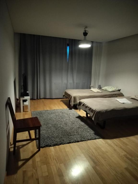 Postel nebo postele na pokoji v ubytování Rypys 74 X