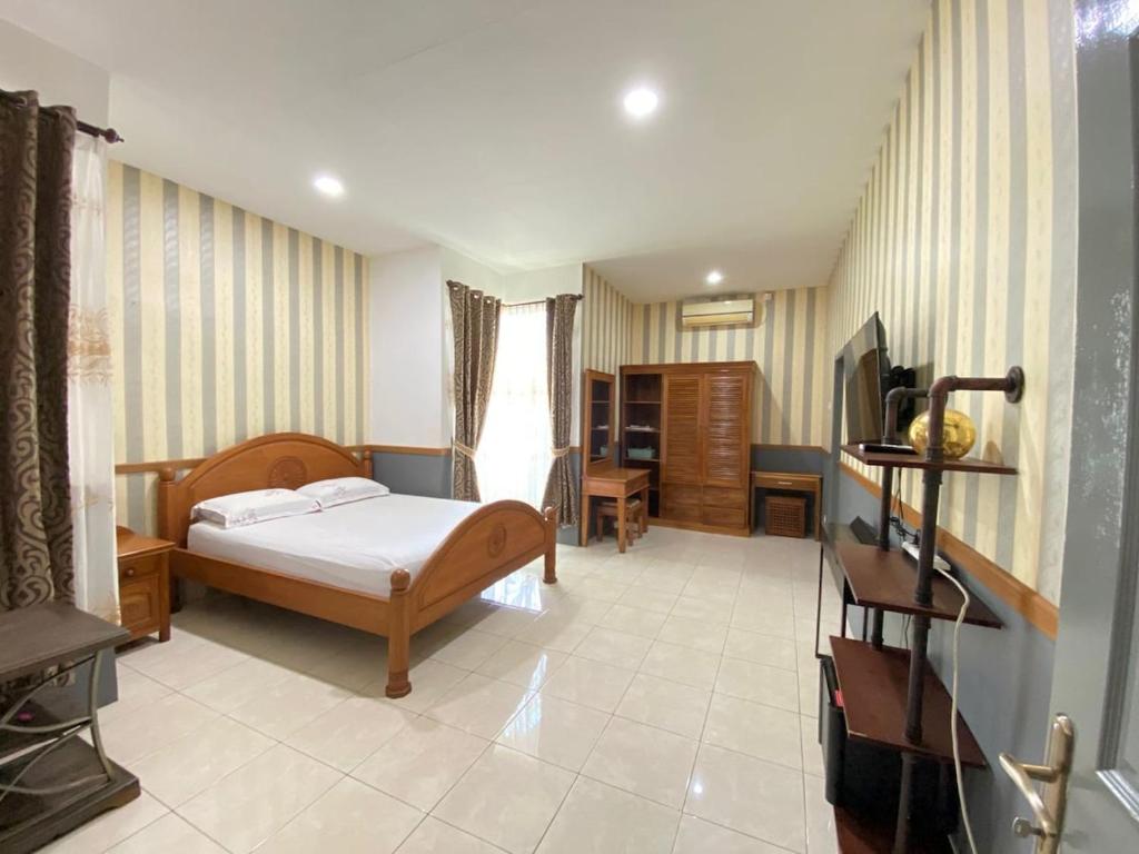 Ένα ή περισσότερα κρεβάτια σε δωμάτιο στο Entire Home in West Lombok near Senggigi