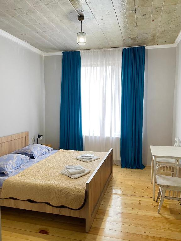 Postel nebo postele na pokoji v ubytování Khedi