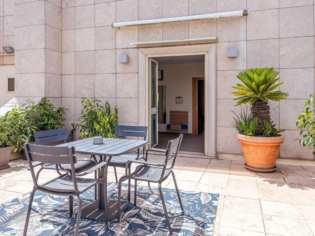 Balkón nebo terasa v ubytování Novotel Roma Est