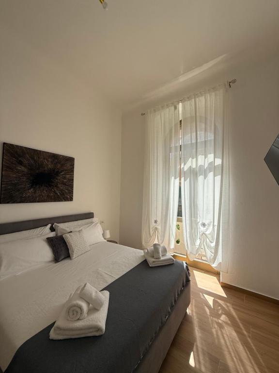 Postel nebo postele na pokoji v ubytování Casa Camilla&Iris