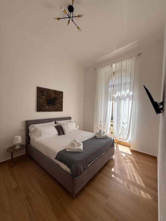 Postel nebo postele na pokoji v ubytování Casa Camilla&Iris