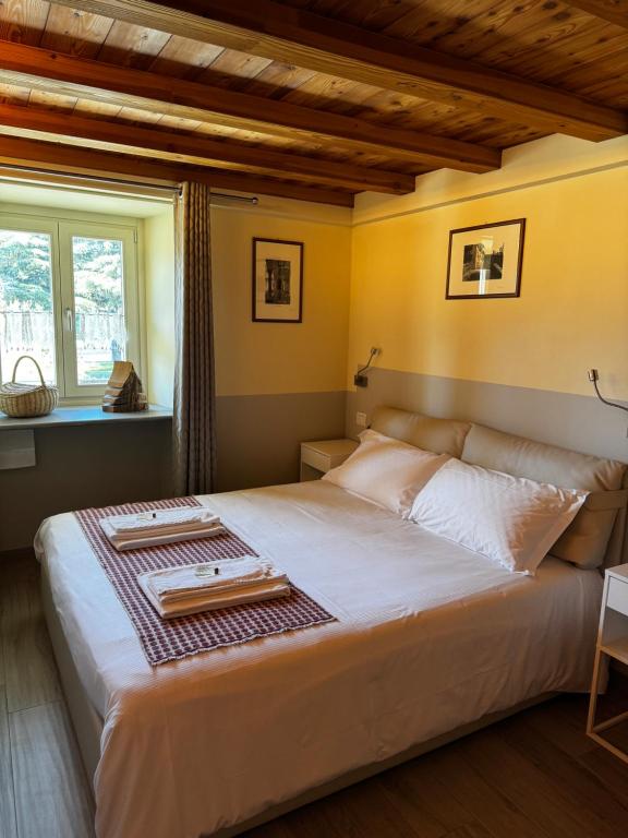 Posteľ alebo postele v izbe v ubytovaní Maison Palmira