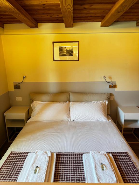 A bed or beds in a room at Maison Palmira