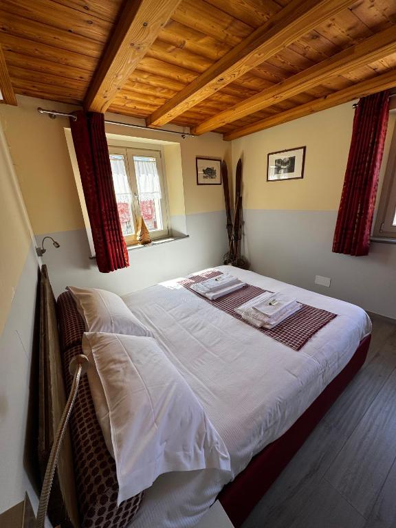 A bed or beds in a room at Maison Palmira