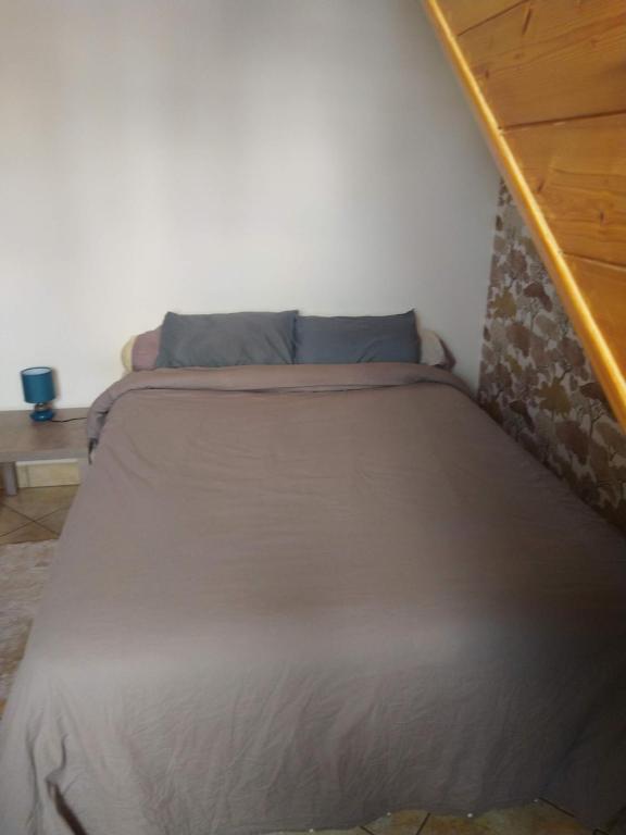 Postel nebo postele na pokoji v ubytování Maison Sérénité