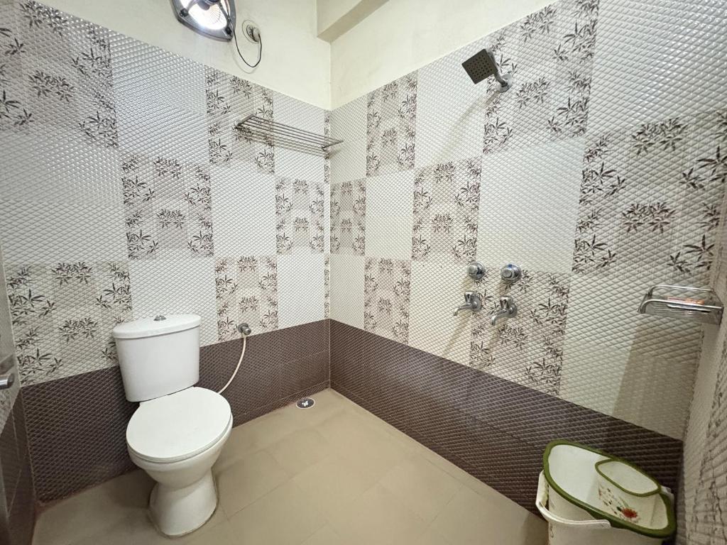 Koupelna v ubytování Hotel Benson Blue In Cuttack