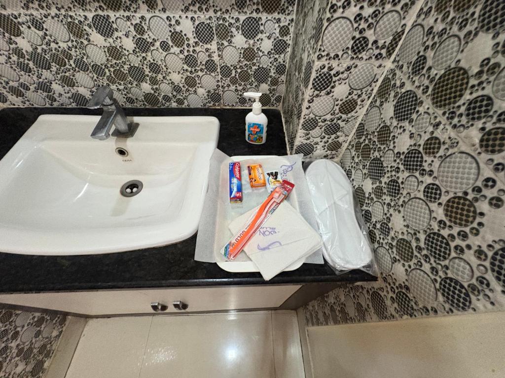 Koupelna v ubytování Hotel Benson Blue In Cuttack
