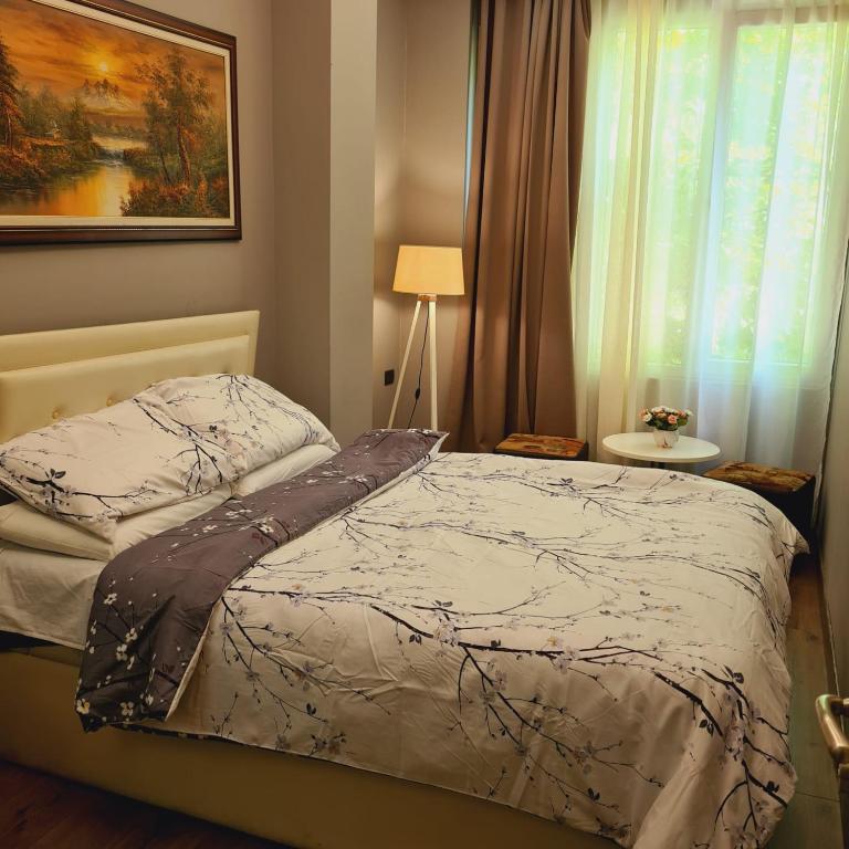 Postel nebo postele na pokoji v ubytování Driti Hotel & Apartments