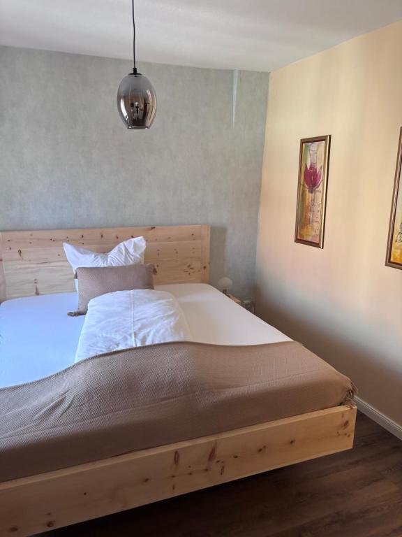 Postel nebo postele na pokoji v ubytování Hotel Ristorante Milano