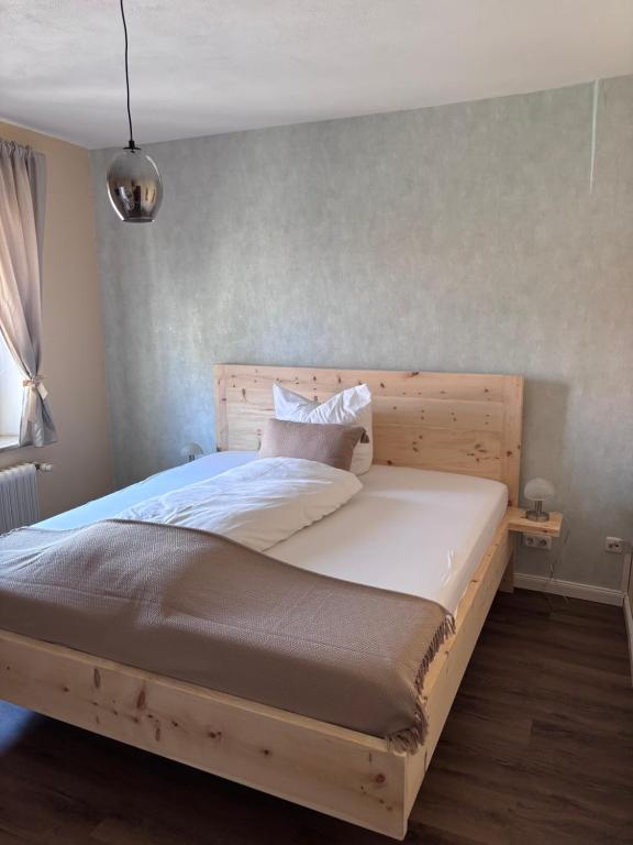 Postel nebo postele na pokoji v ubytování Hotel Ristorante Milano