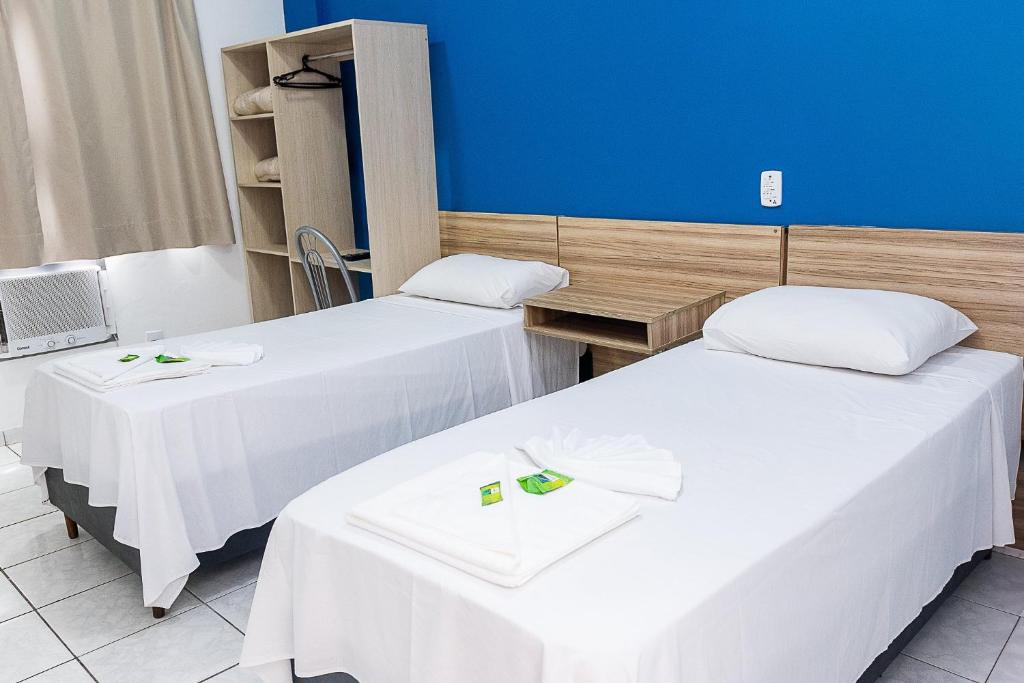 Postel nebo postele na pokoji v ubytování Inter Hotel