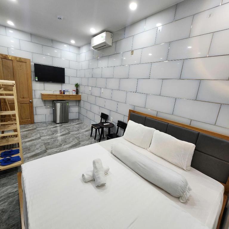 TV a/nebo společenská místnost v ubytování Hotel & Homestay LABUBU