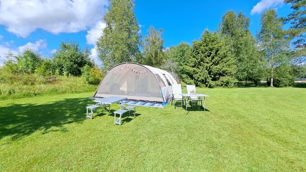Zahrada ubytování Tunneltent, minicamping Nästorp broa