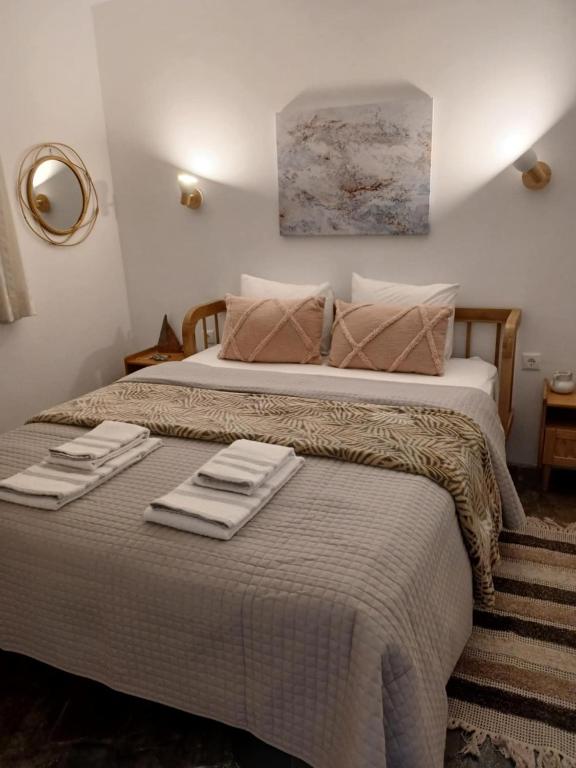 Postel nebo postele na pokoji v ubytování Serenity Maisonnette