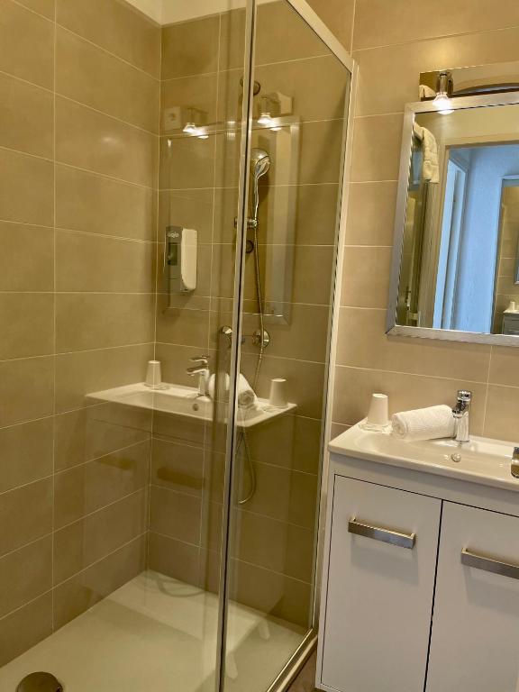 Koupelna v ubytování Hotel L'Escale