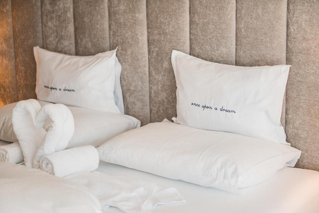 Posteľ alebo postele v izbe v ubytovaní Prunner Luxury Suites - Adults Only