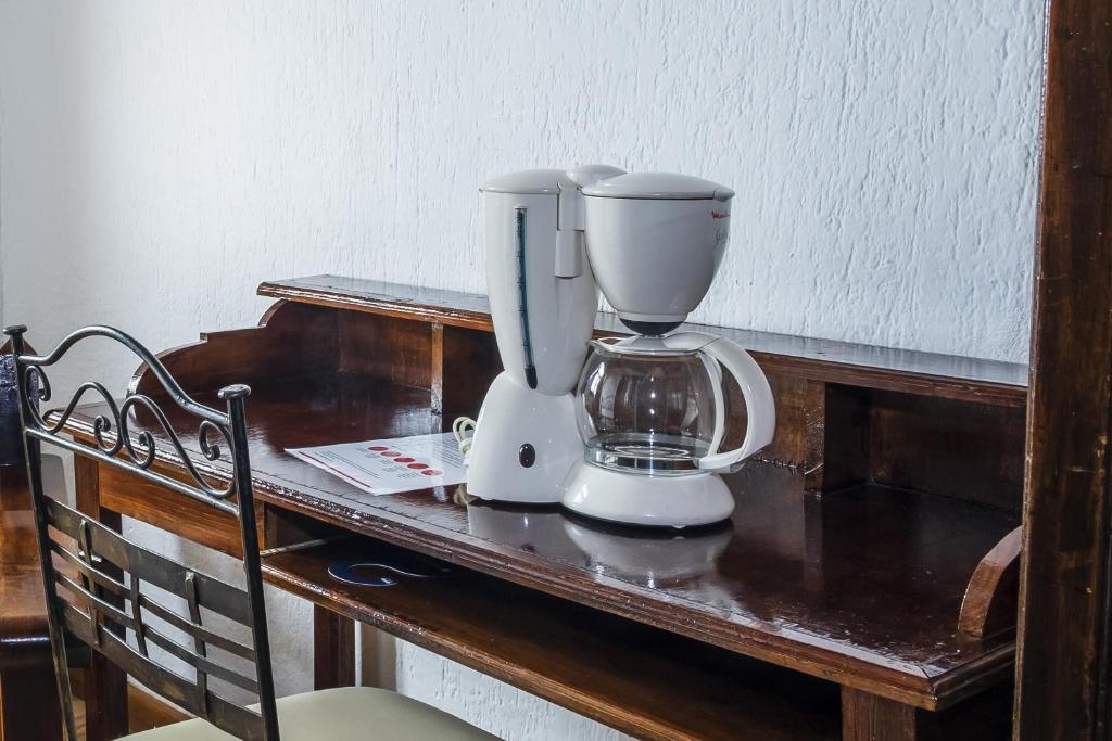 Příslušenství pro přípravu čaje a kávy v ubytování Capital O Hotel Central, Xalapa