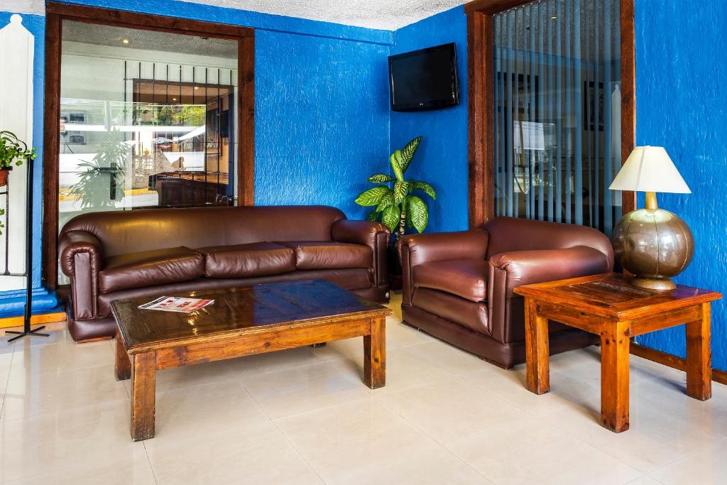 Posezení v ubytování Capital O Hotel Central, Xalapa