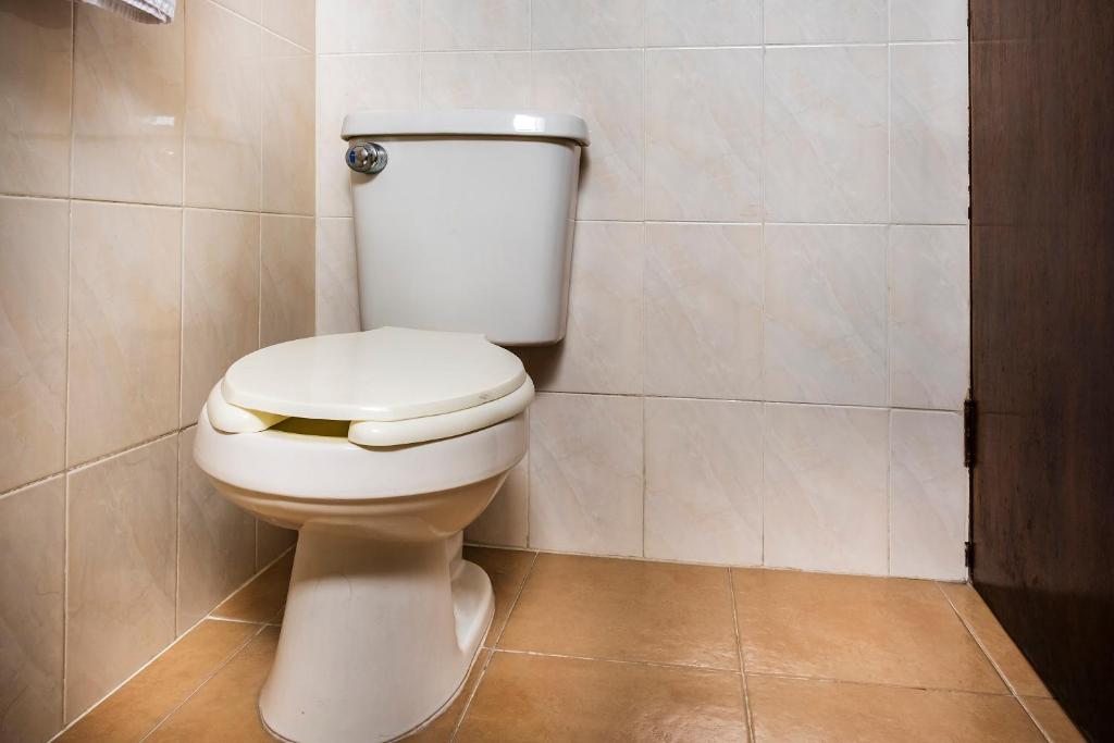 Koupelna v ubytování Capital O Hotel Central, Xalapa