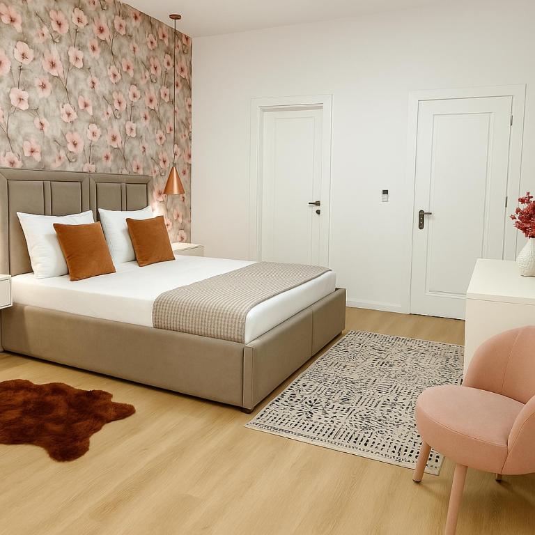 Postel nebo postele na pokoji v ubytování Hotel Capital Inn Tirana