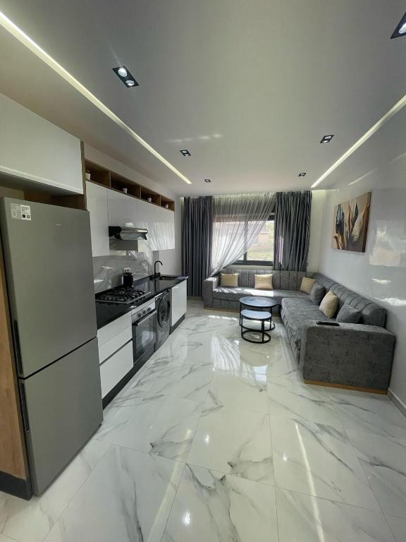 Kuchyň nebo kuchyňský kout v ubytování Oumaira Residence Azla-Tetouan