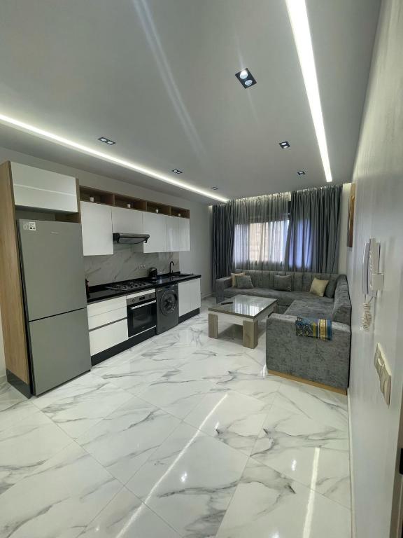 Kuchyň nebo kuchyňský kout v ubytování Oumaira Residence Azla-Tetouan