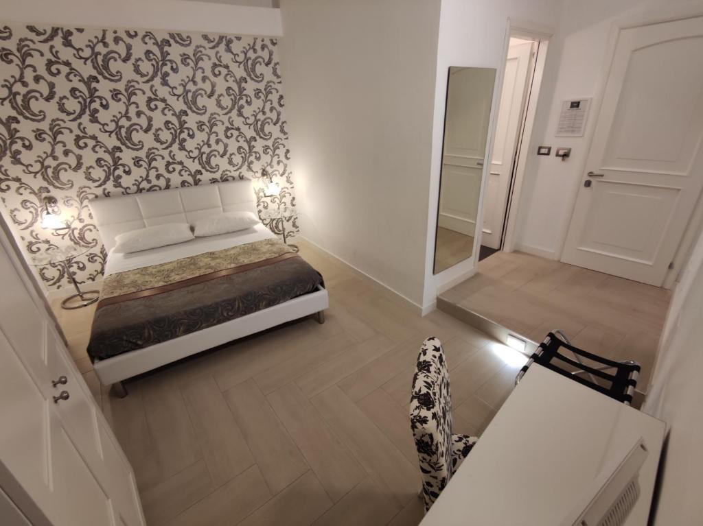 Postel nebo postele na pokoji v ubytování SAMI Rooms Due - Teatro a 400 mt - Ortigia a 1500 mt -