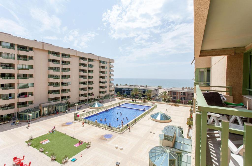 an overhead view of a pool at a hotel at Apartment Patacona Beach 9 in Valencia