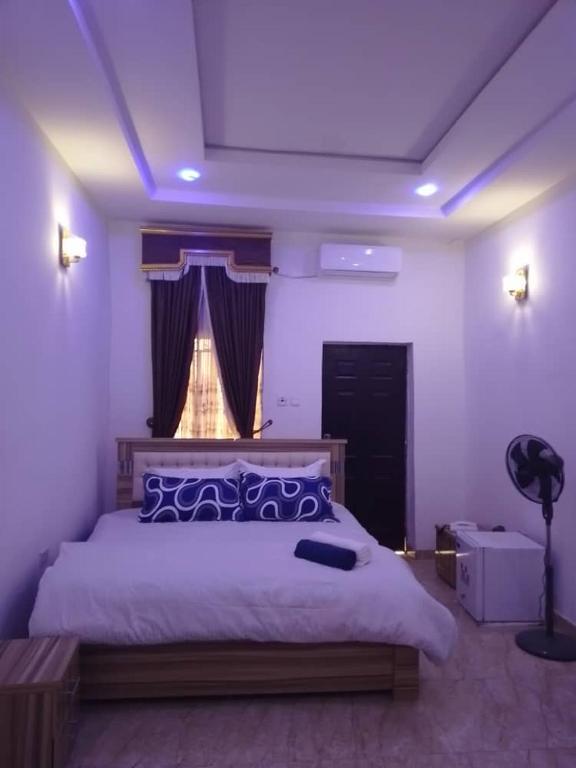 Ένα ή περισσότερα κρεβάτια σε δωμάτιο στο Seductively