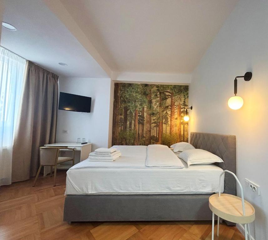 Postel nebo postele na pokoji v ubytování Vila A&B